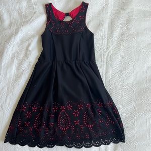 Black dress with red accents